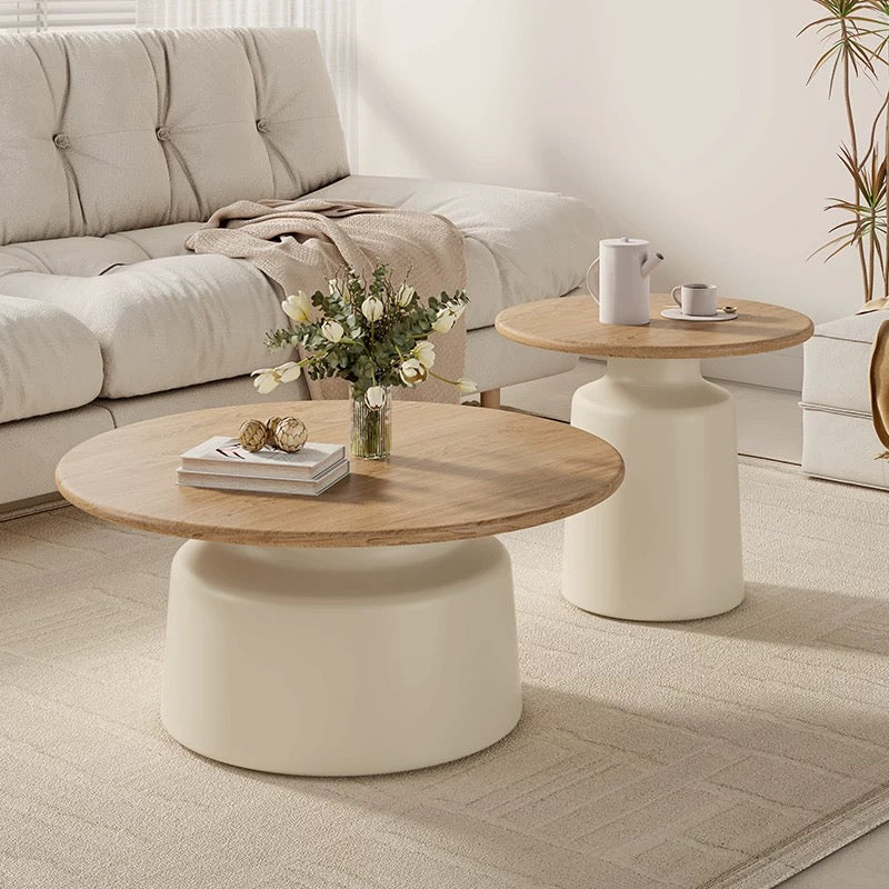 cream round top table