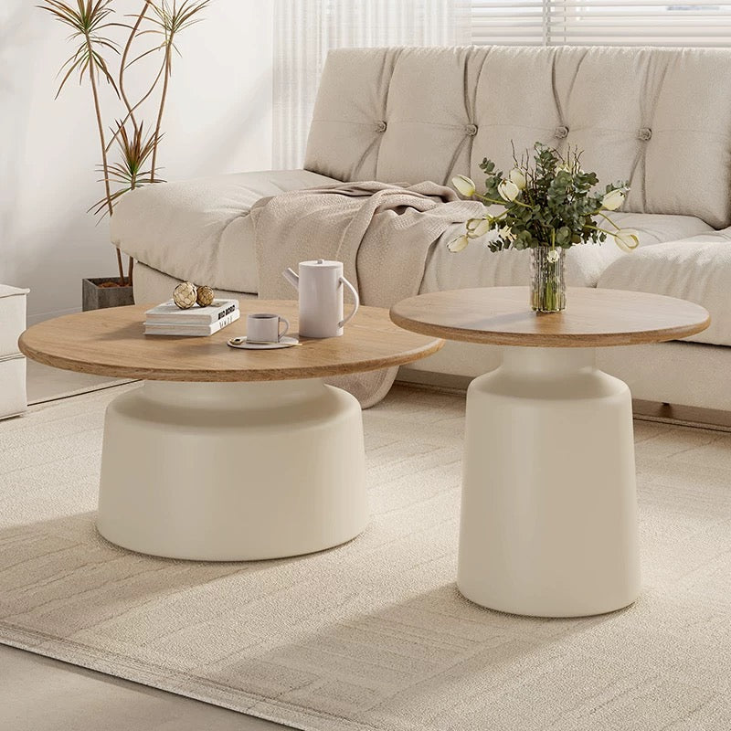 cream round top table