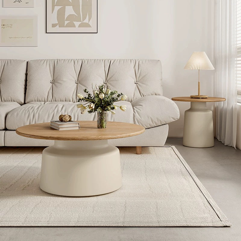 cream round top table