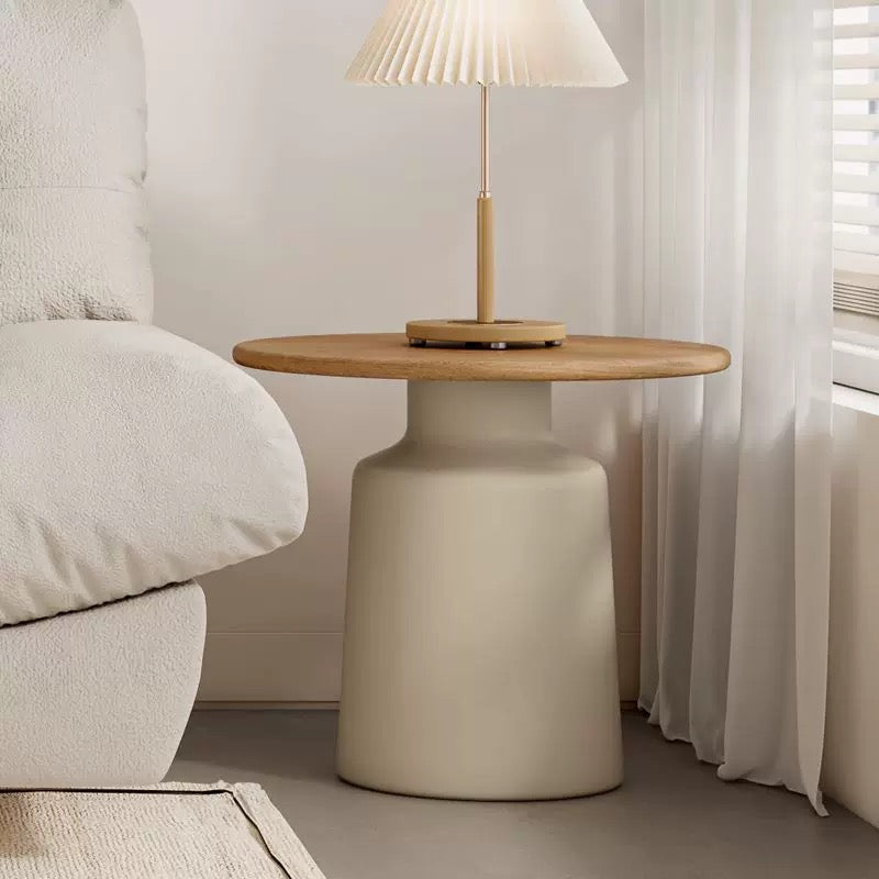 cream round top table