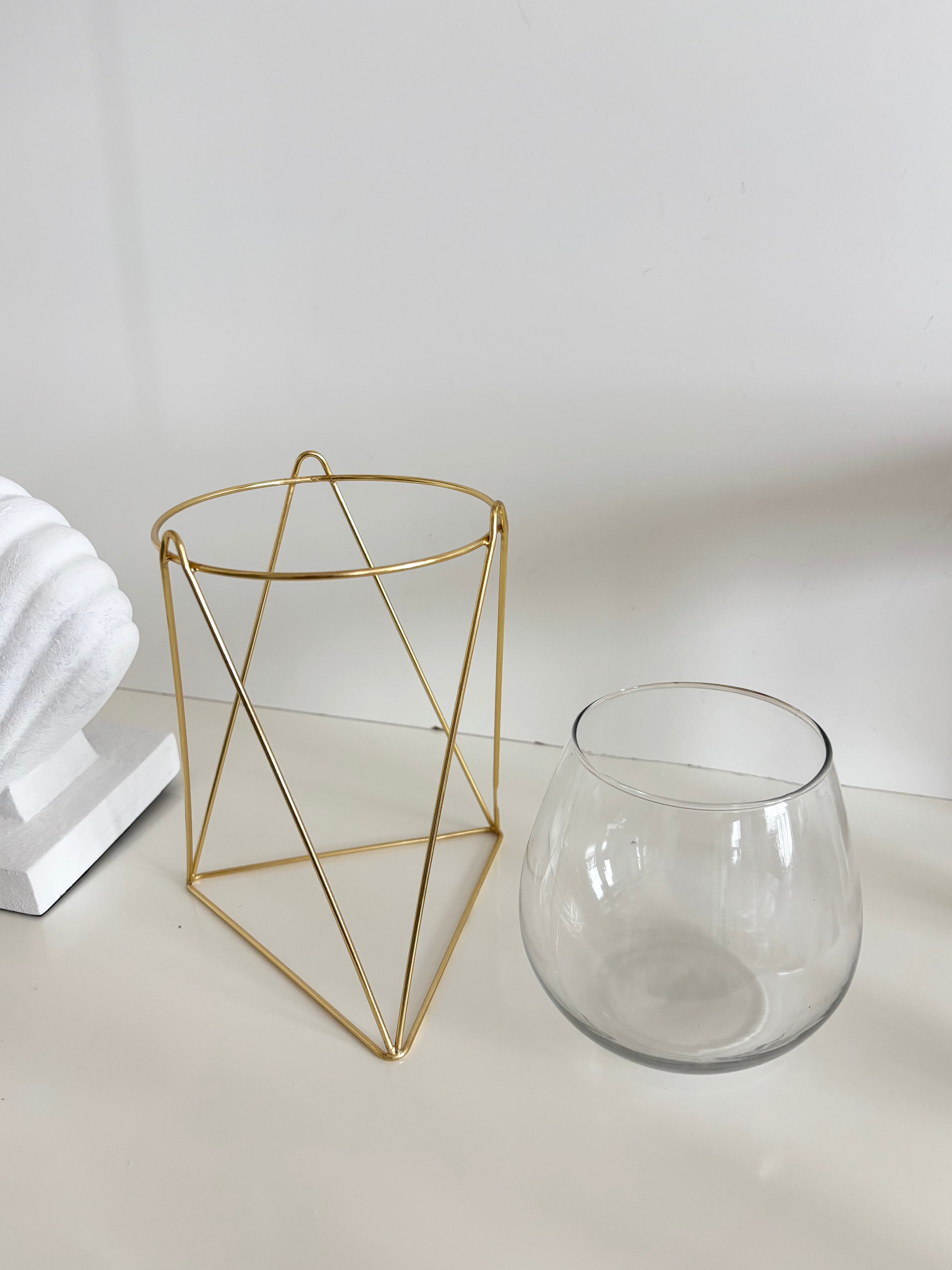 in bloom stand glass vase